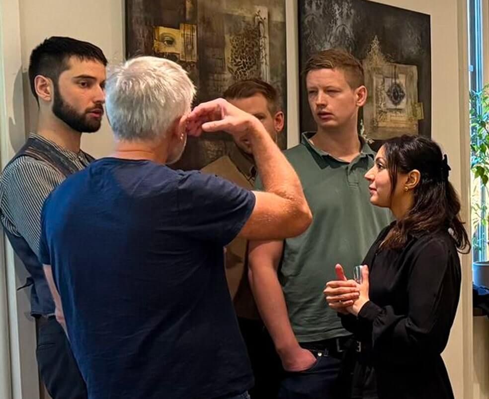 Our colleagues discussing a problem.